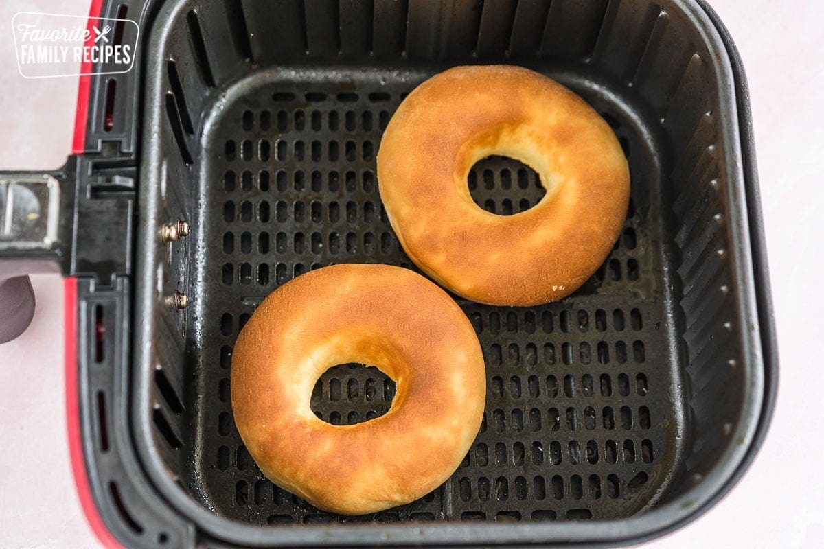 Two donuts after being cooked in an air fryer