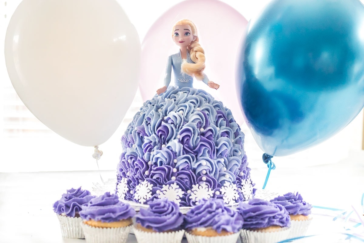 A cake made from an Elsa Barbie Doll