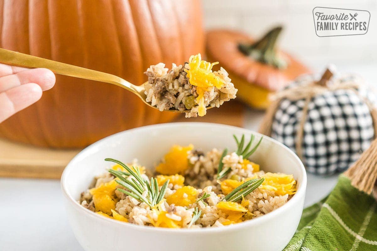 A spoonful of dinner in a pumpkin casserole