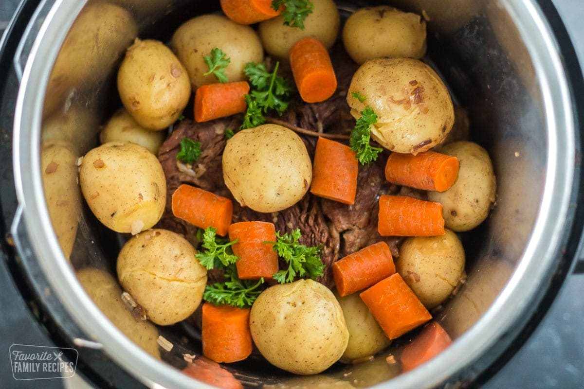 Chuck roast being cooked in an Instant Pot.