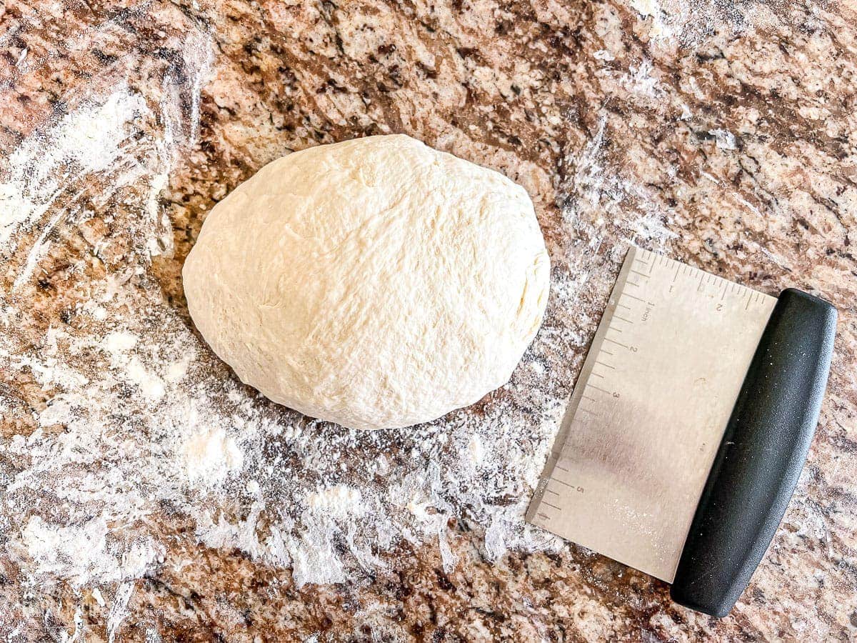 A large pizza dough ball