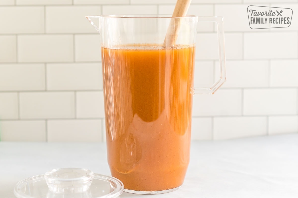 A pitcher full of pumpkin juice