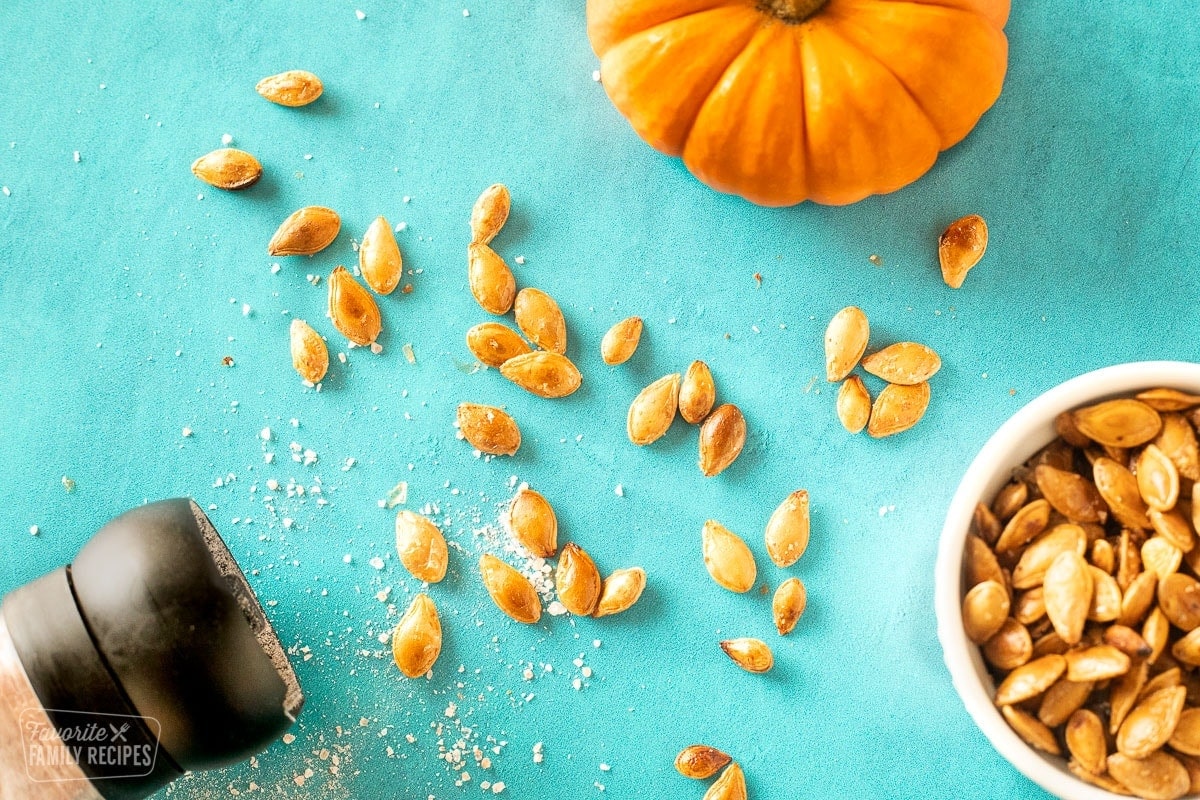 Pumpkin seeds spread out on a table.
