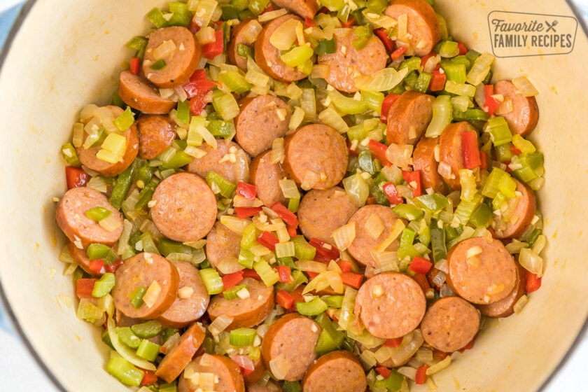 Sausage, peppers, onions, and garlic sautéed in a pot