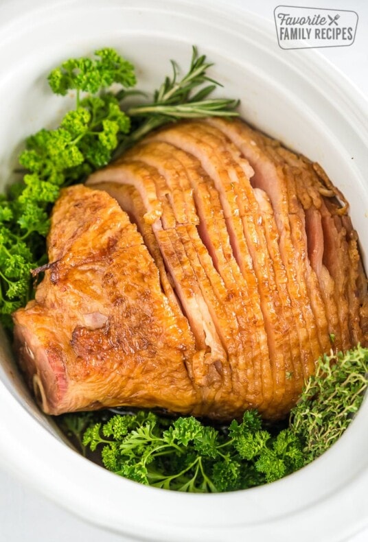 A spiral cut ham in the slow cooker