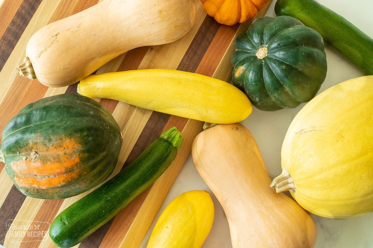 Summer and winter squash varieties including butternut, yellow, pumpkin, zucchini, acorn, and spaghetti squash