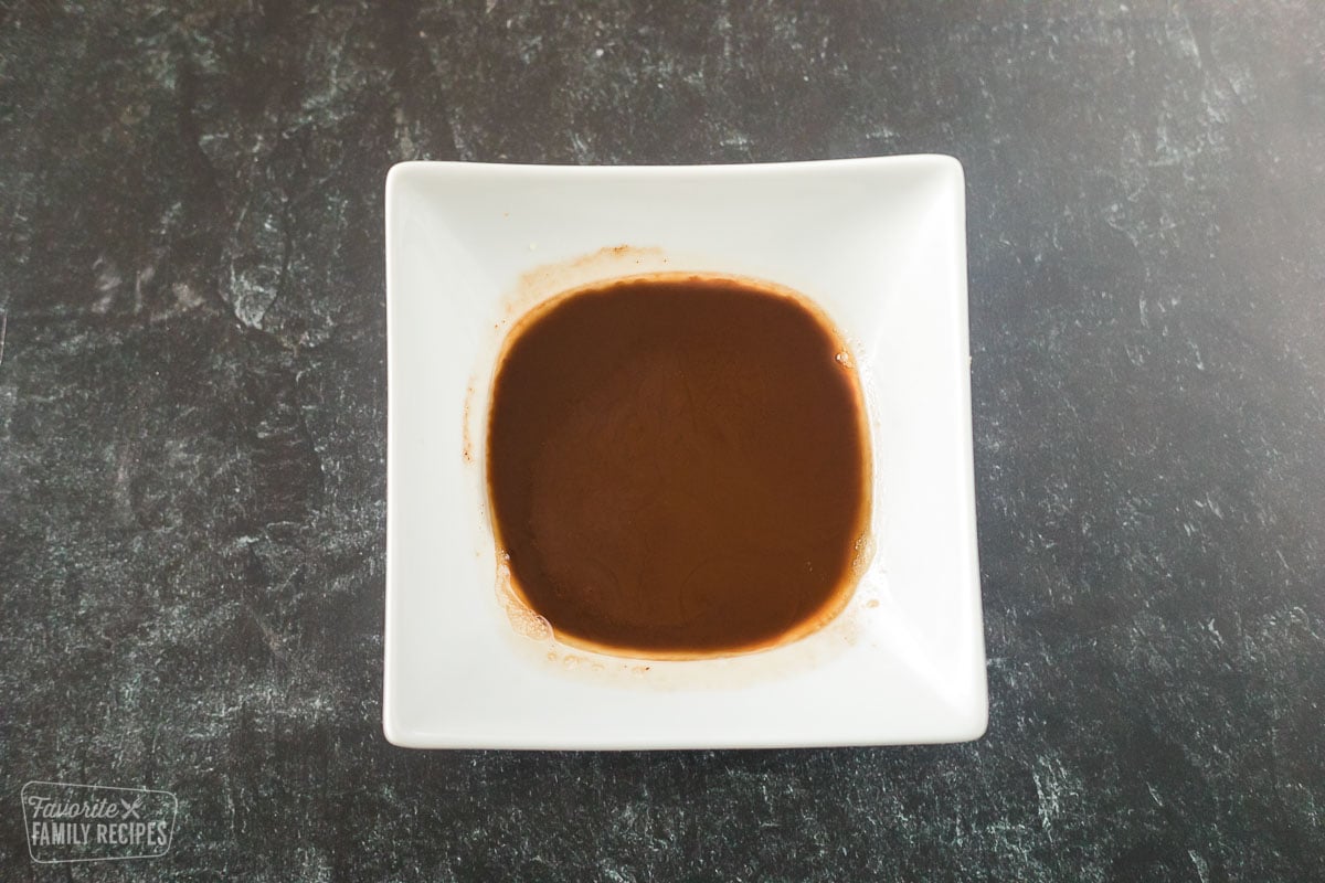 A bowl of dark brown roux.