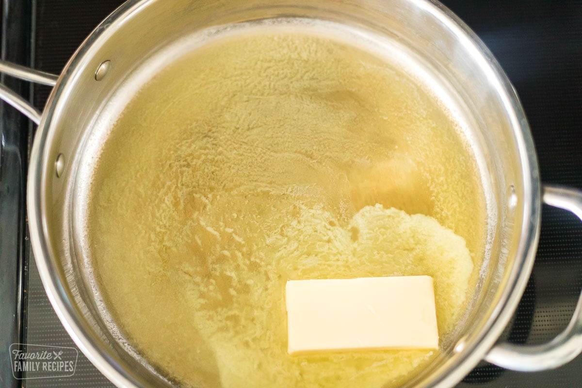 butter being melted in a skillet