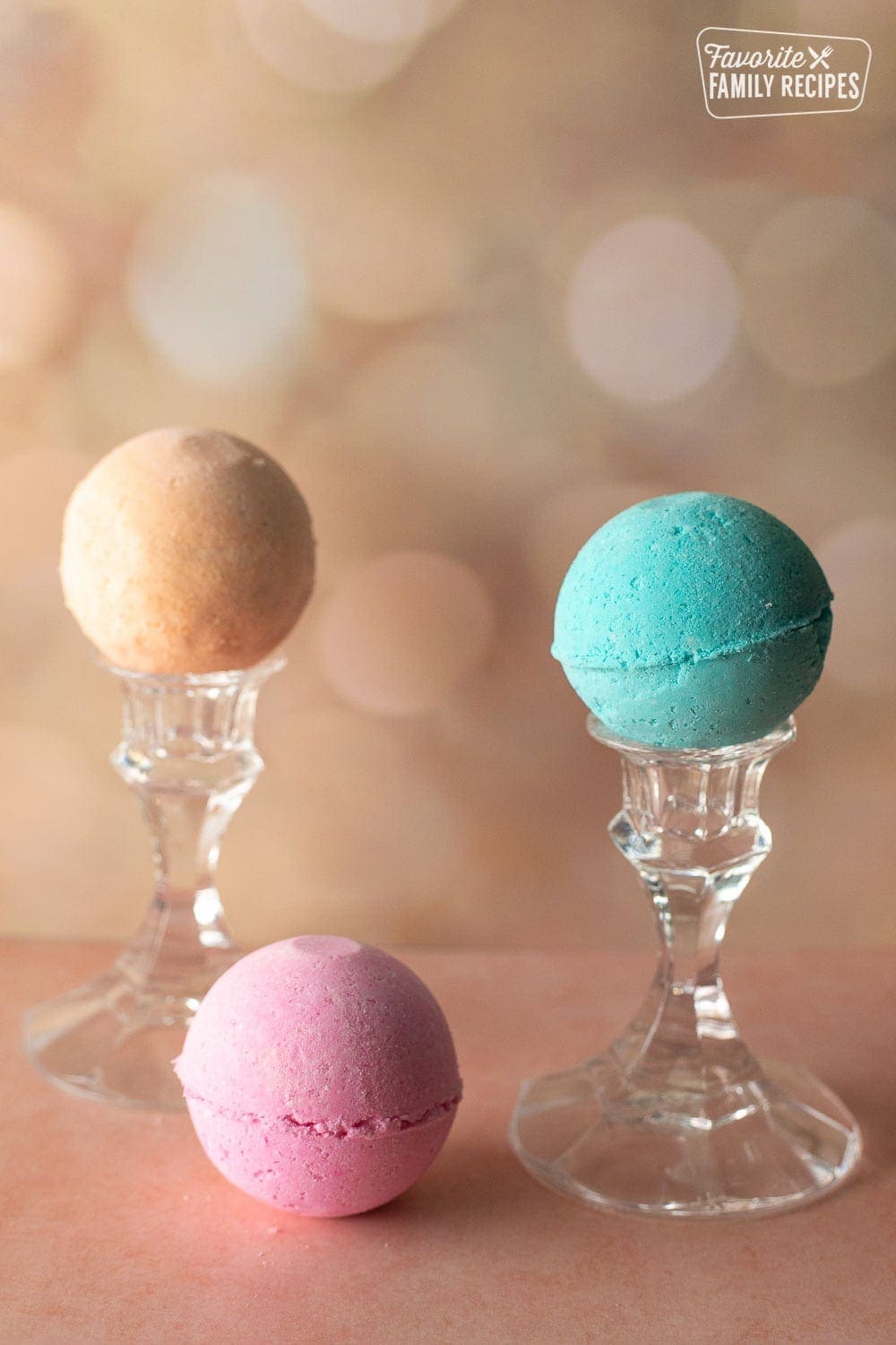 Pink, orange, and blue bath bombs