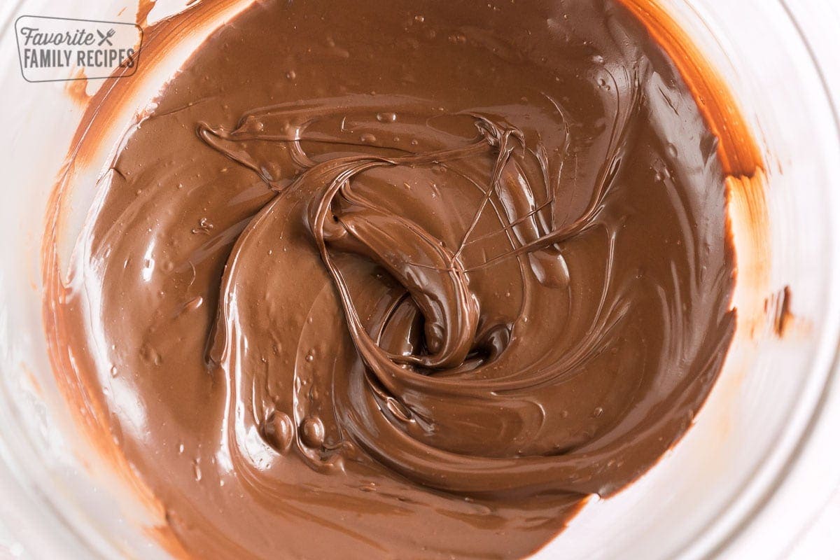 Melted chocolate chips in a glass bowl