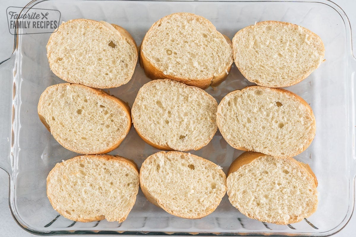 Slices of French bread in a pan