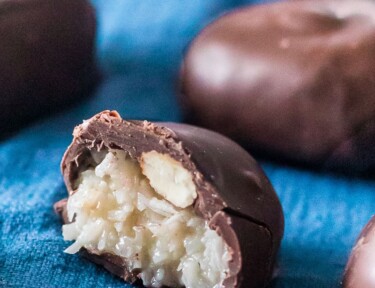 Close up of a homemade almond joy to show the coconut and almond