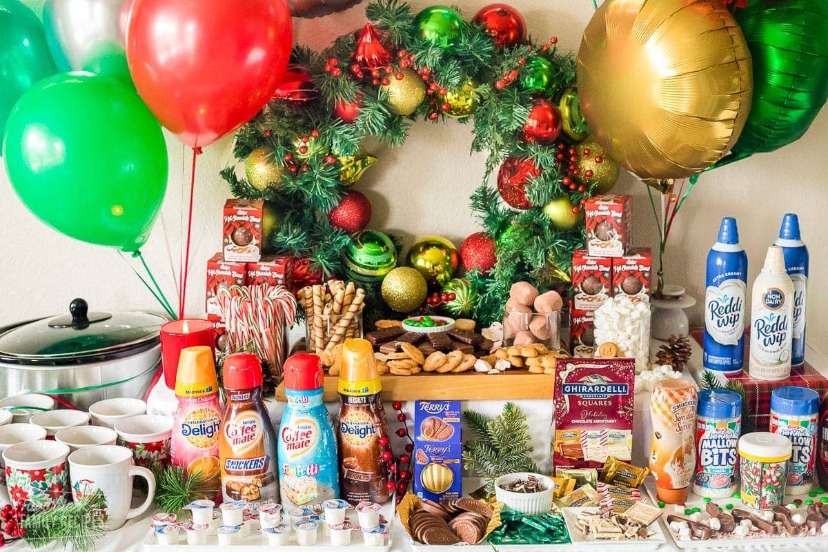 Set up an epic hot chocolate bar that your family and holiday guests will rave about using these easy recipes, ideas, and tips. Creamers, treats, whipped cream, and other toppings to make a hot chocolate bar.