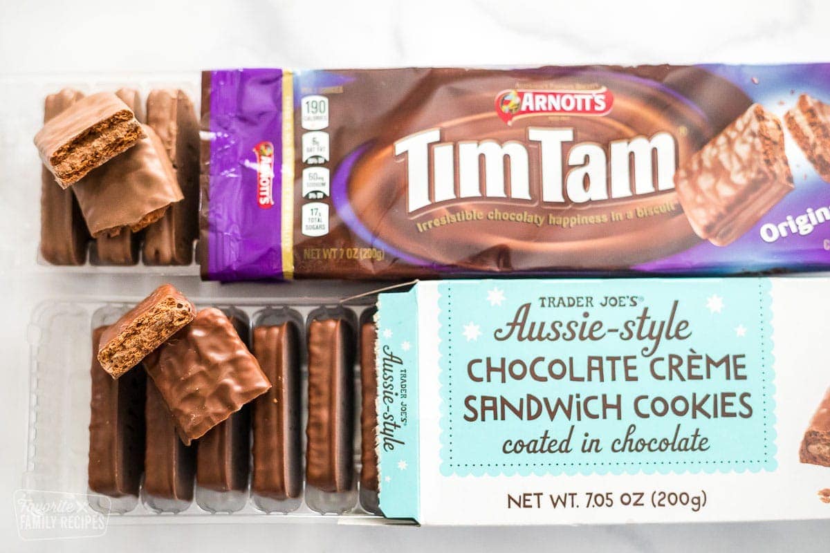 A pack of Tim Tams and a pack of Trader Joe's Aussie-Style chocolate creme sandwich cookies