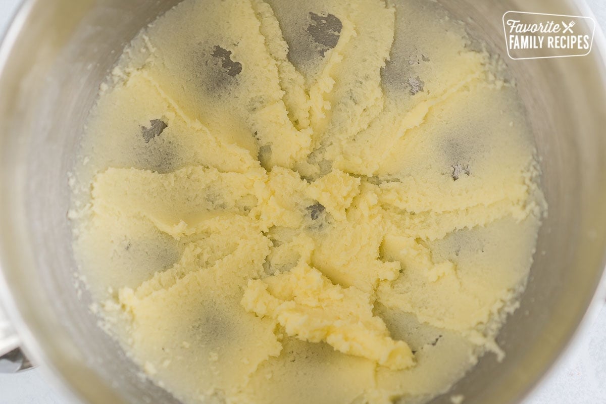 Butter and sugar creamed together in a mixing bowl