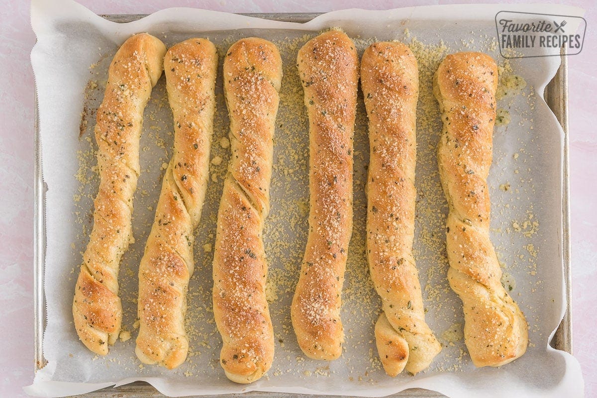 Baked breadsticks on a baking sheet