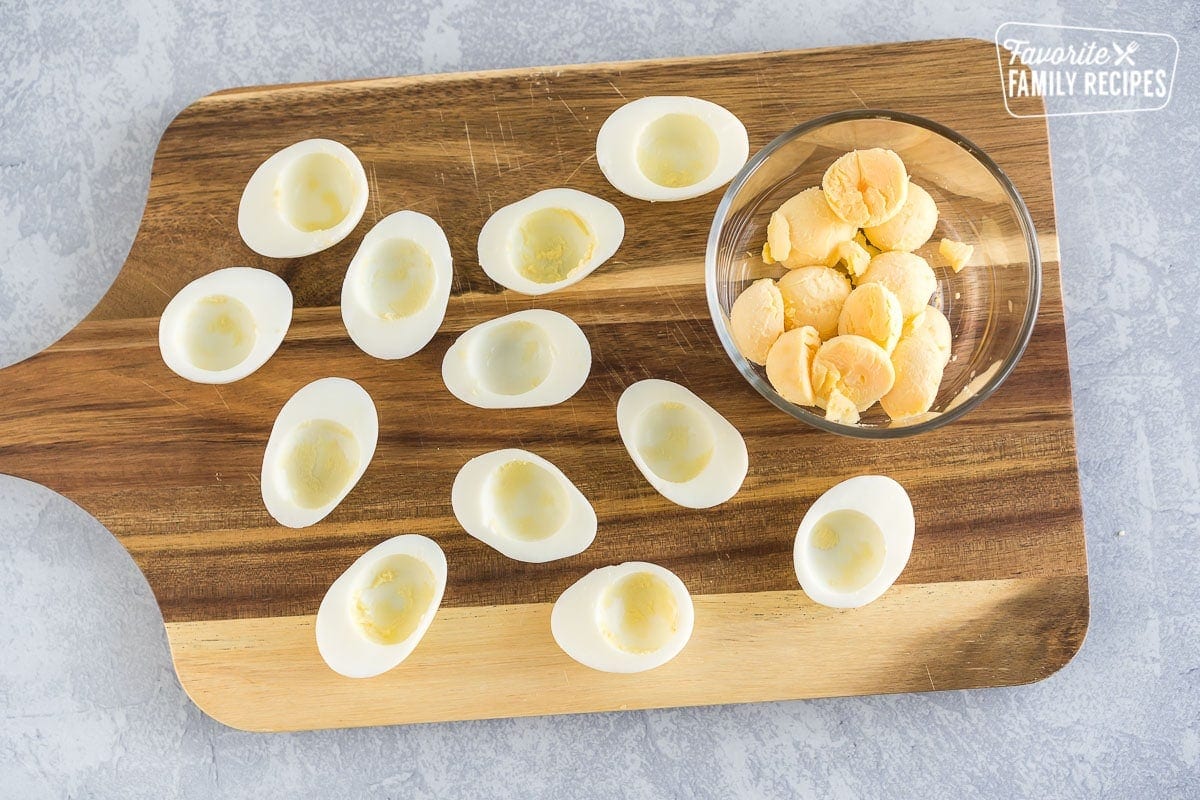 Hard boiled eggs cut in half with the yolks removed.