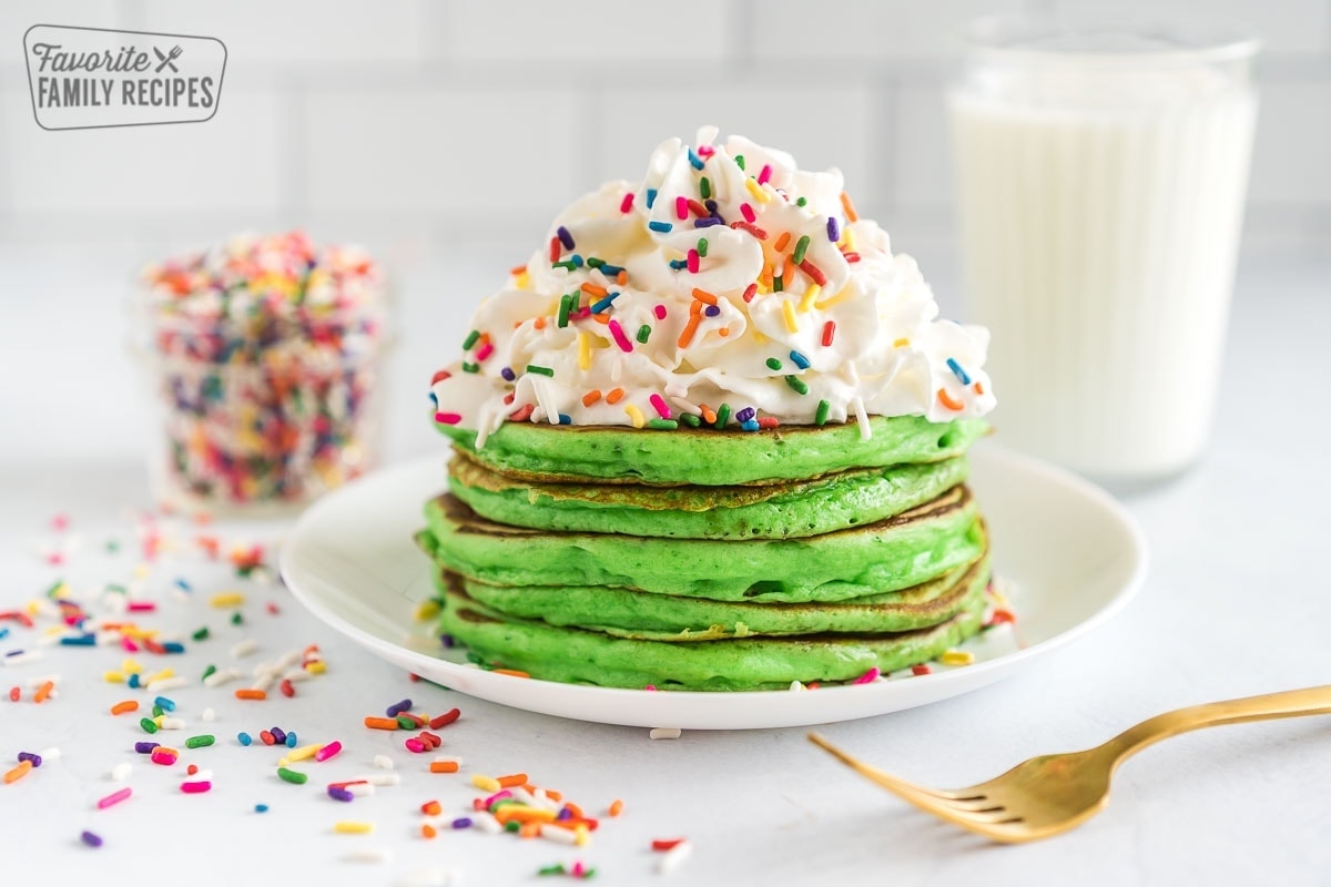 Stack of Green Pancakes for St. Patrick's Day with rainbow sprinkles