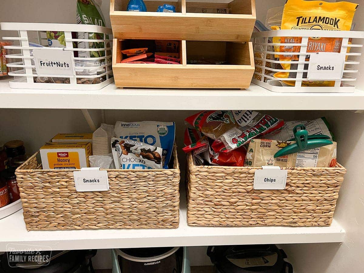 Chips and snacks that have been organized in wicker bins