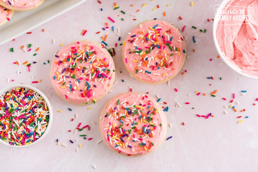 Pink frosted sugar cookies with sprinkles