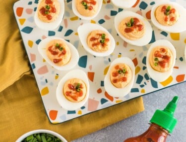 A platter of sriracha deviled eggs