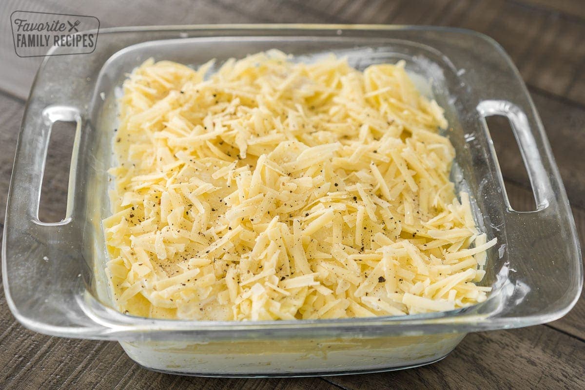 Unbaked Au Gratin potatoes in a baking dish before they go in the oven.