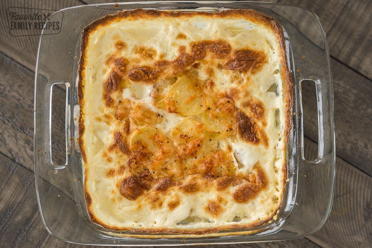 Au Gratin Potatoes baked in a square glass baking dish