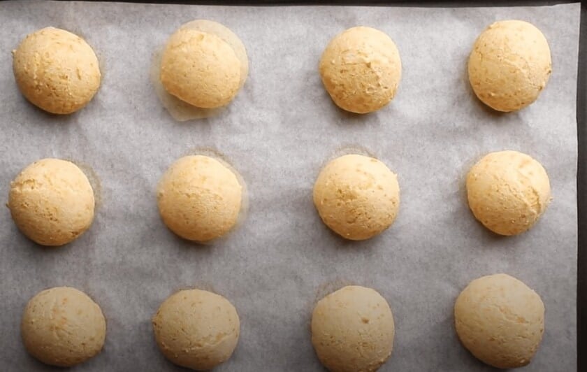 Brazilian cheese bread that has been baked on a baking sheet