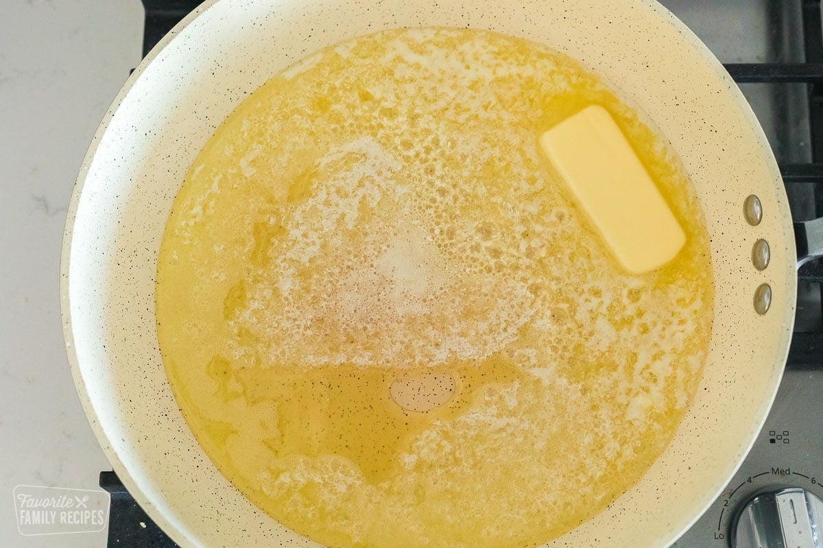 A large pan with melted butter