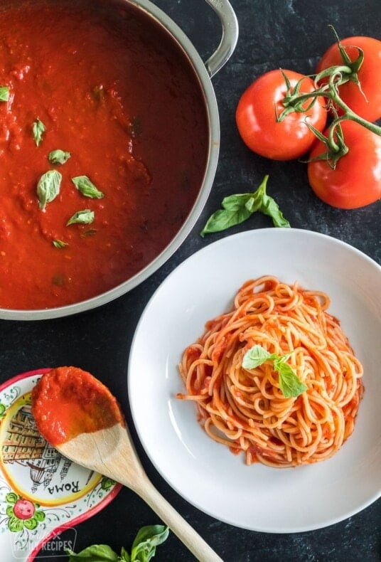 A plate of spaghetti with pomodoro sauce