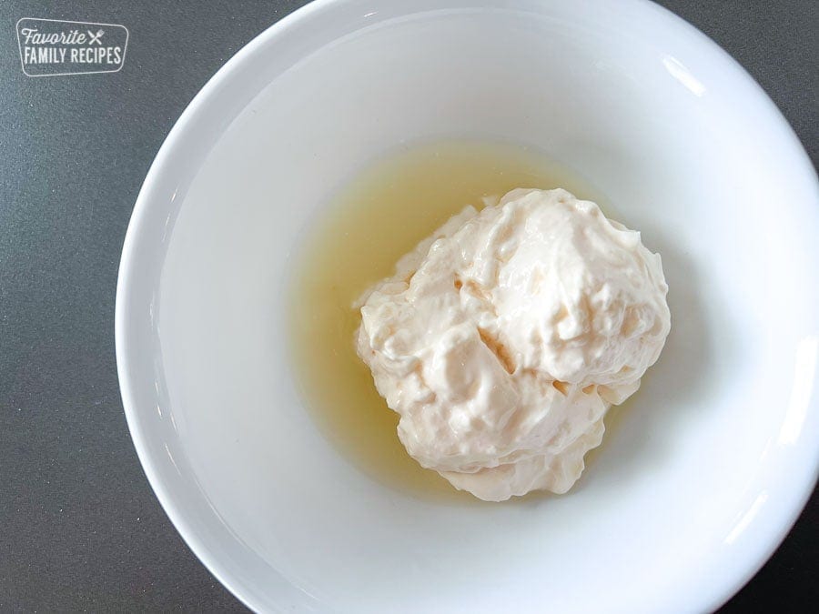 Mayo and lemon juice in a bowl