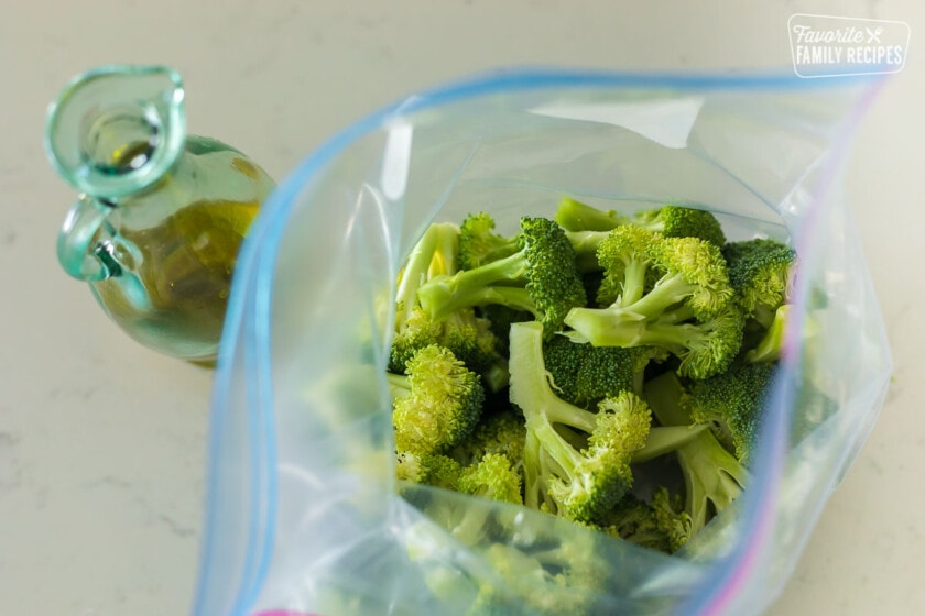 Top view of uncooked broccoli in a zip-top bag