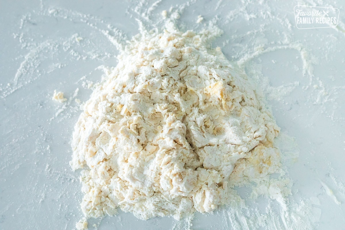 Flour and egg combined together before kneading into homemade pasta dough