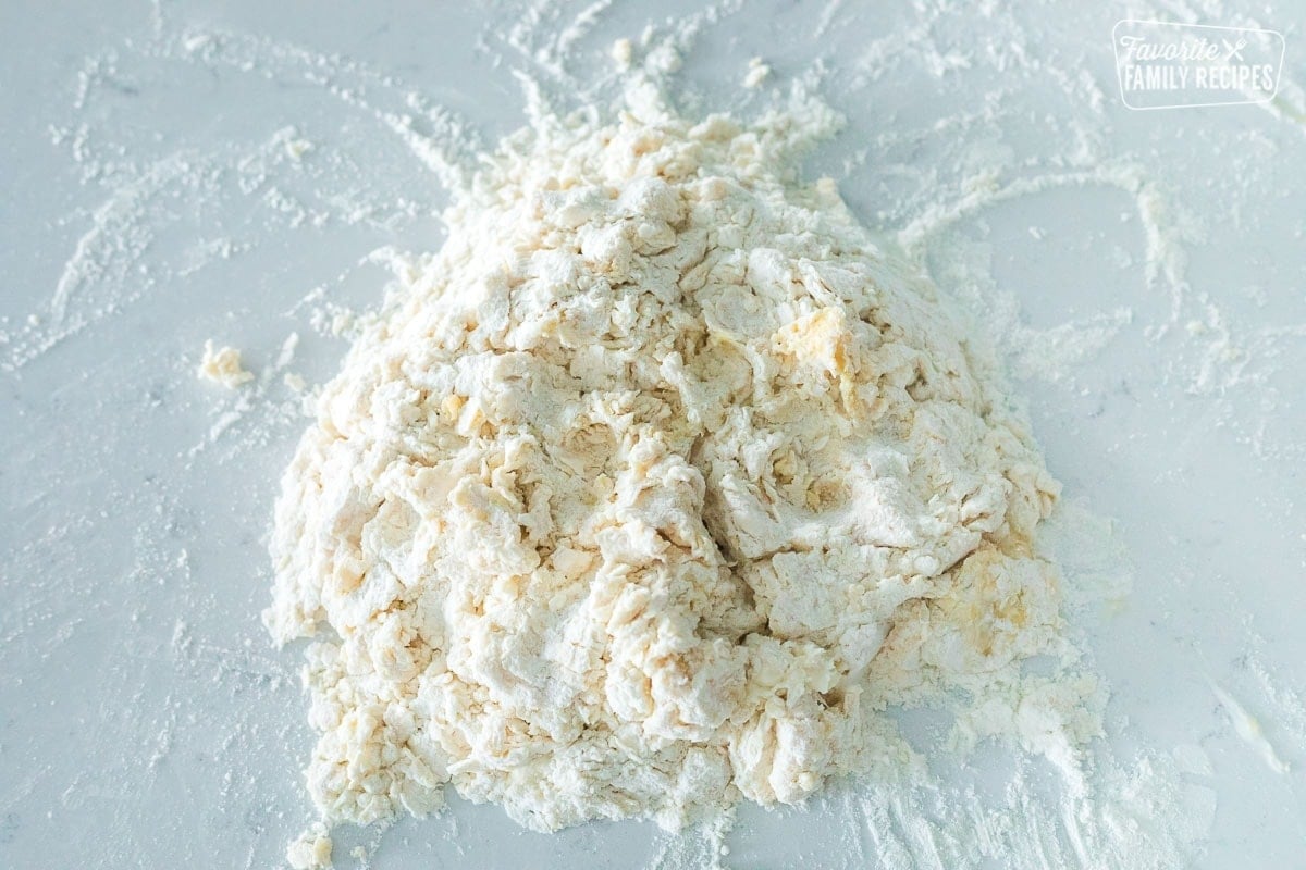 Flour and egg combined together before kneading into homemade pasta dough