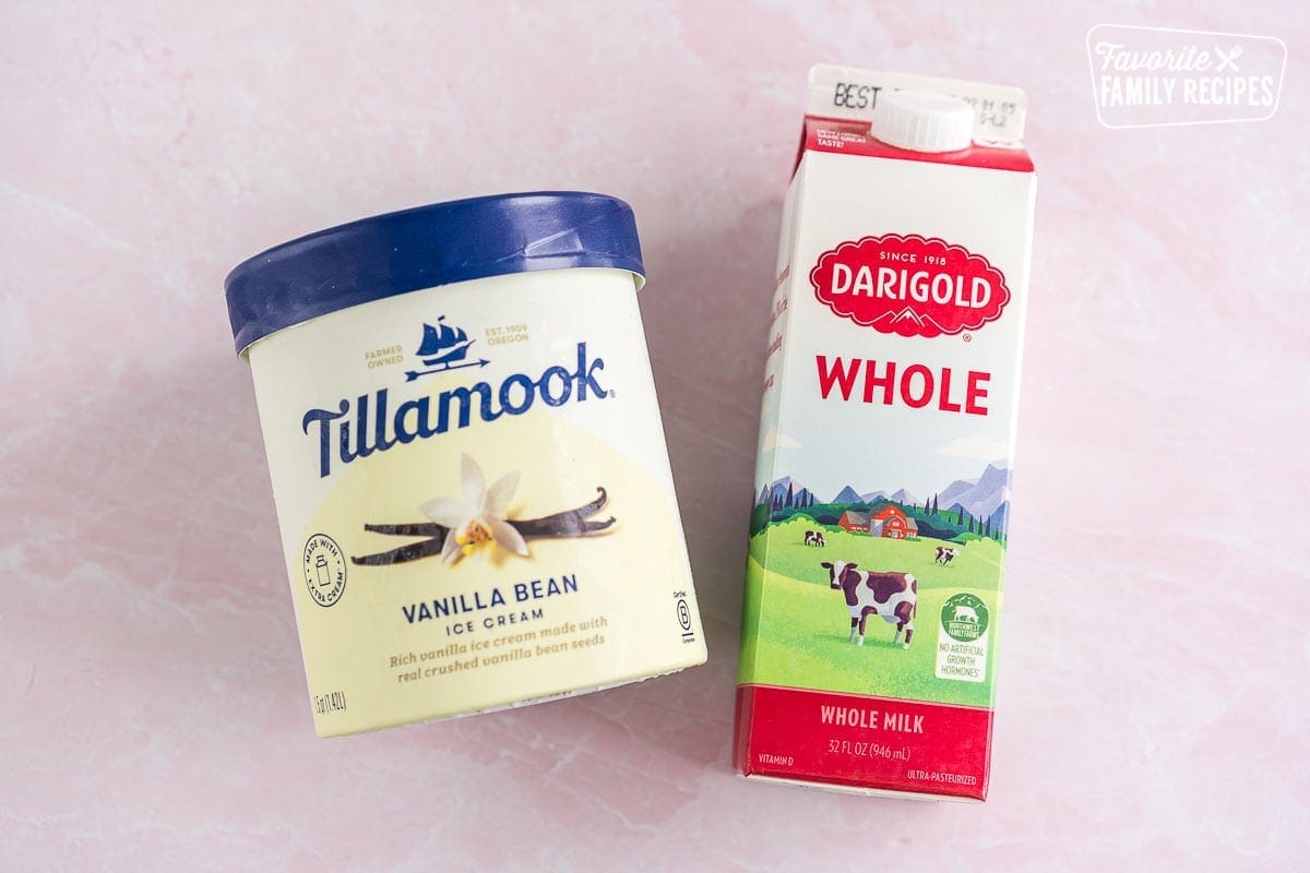 A container of vanilla ice cream and a container of whole milk