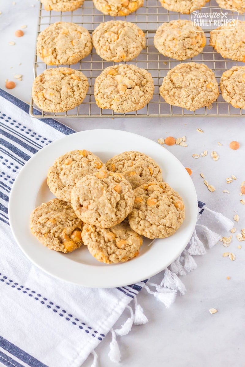 Plate and cooling wrack full of Oatmeal Butterscotch Cookies.