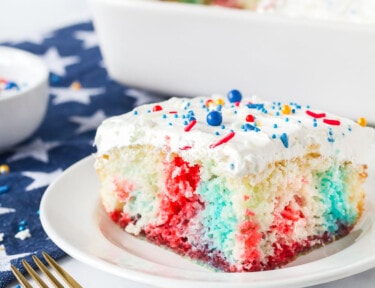 Colorful 4th of July Cake on a serving plate.