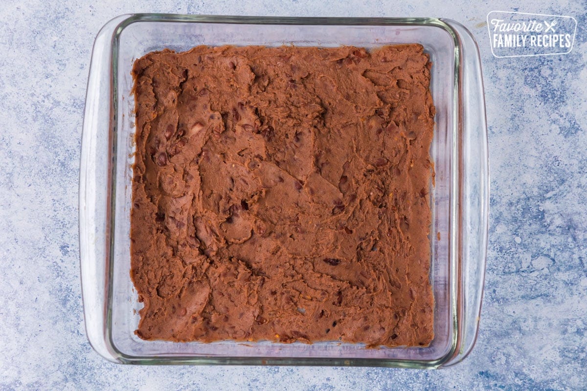 Layered refried beans with seasoning