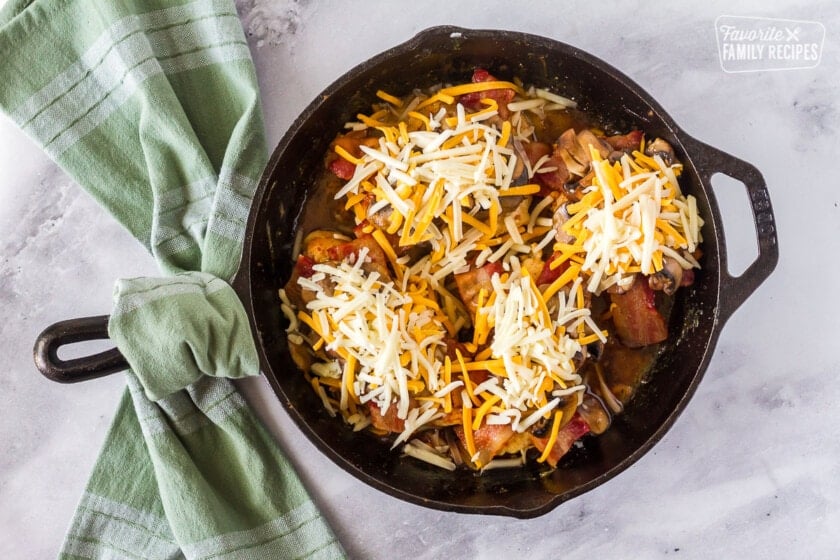 Shredded cheese on top of the Alice Springs Chicken.