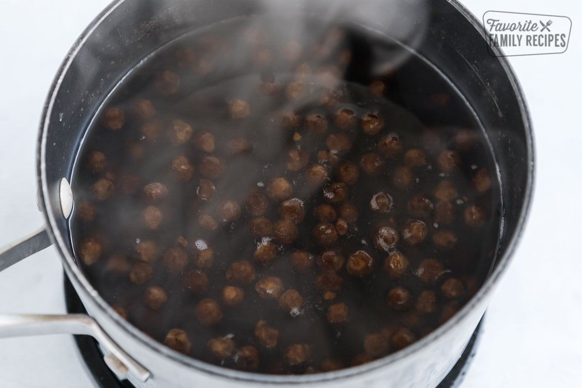 Tapioca pearls in a pot of boiling water.