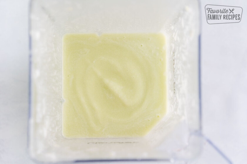 Honeydew and coconut milk mixed in a blender