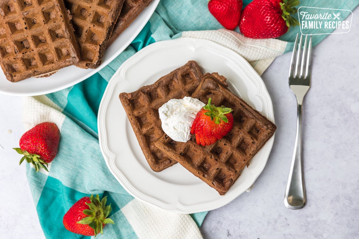 Chocolate Waffles with strawberries and whipped cream