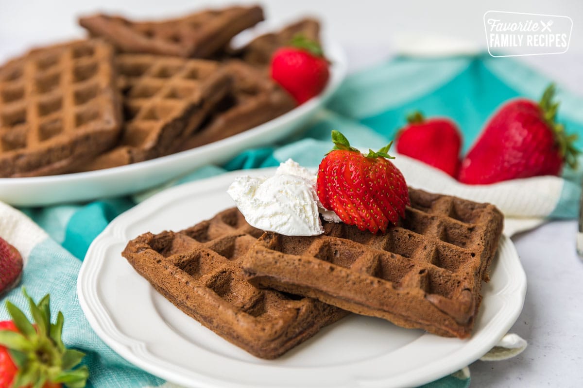 Chocolate Waffles with strawberries and whipped cream