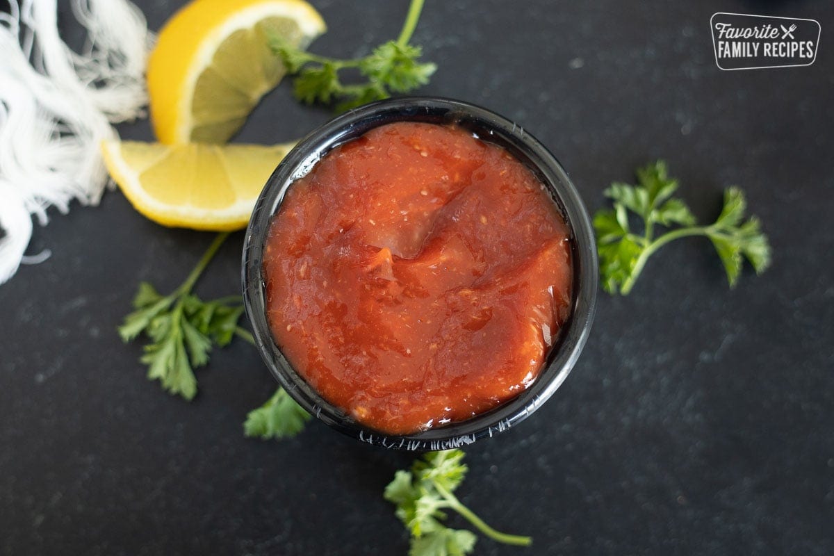 Close up of a small bowl of cocktail sauce.