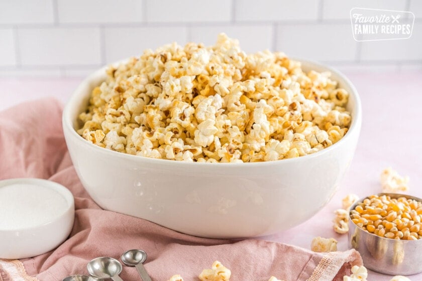A large white bowl full of kettle corn