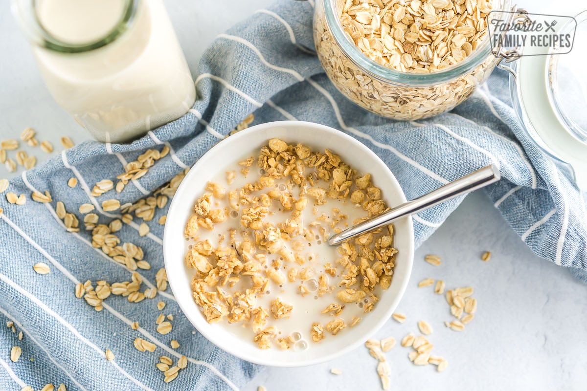 A bowl of granola and oat milk.