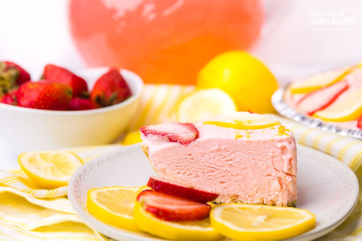 Pink lemonade pie with strawberries and lemons