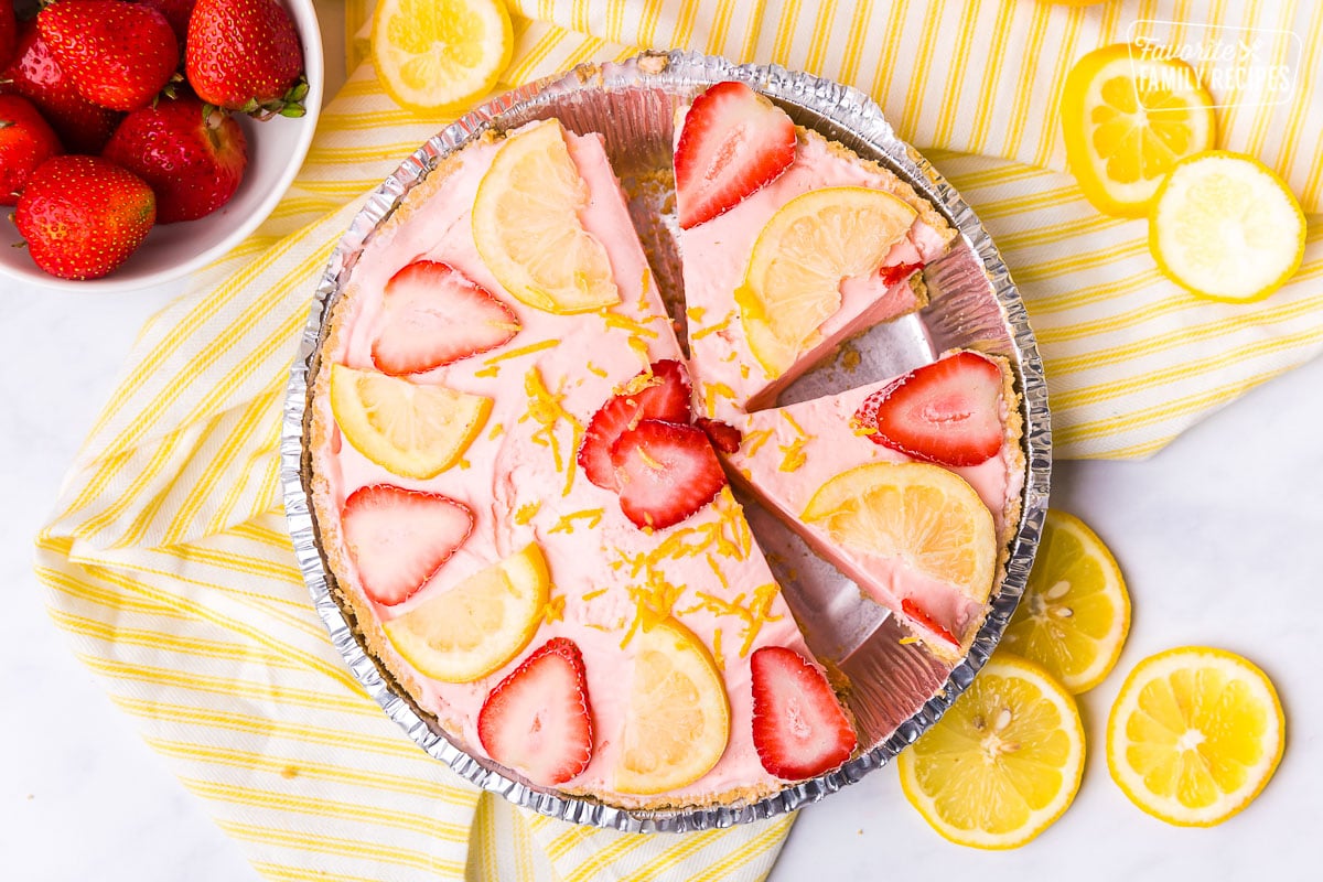 Pink lemonade pie with strawberries and lemons