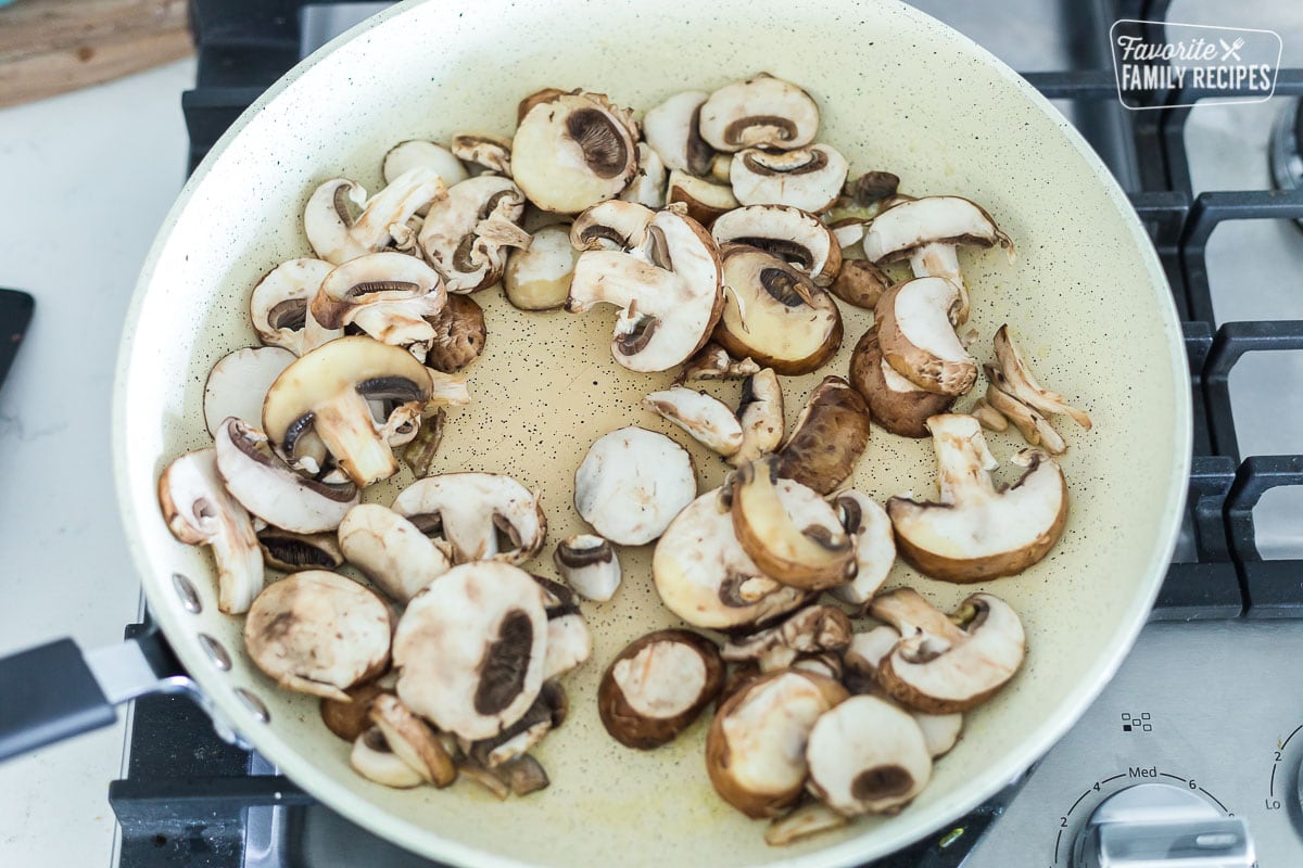 Raw mushrooms in a frying pan