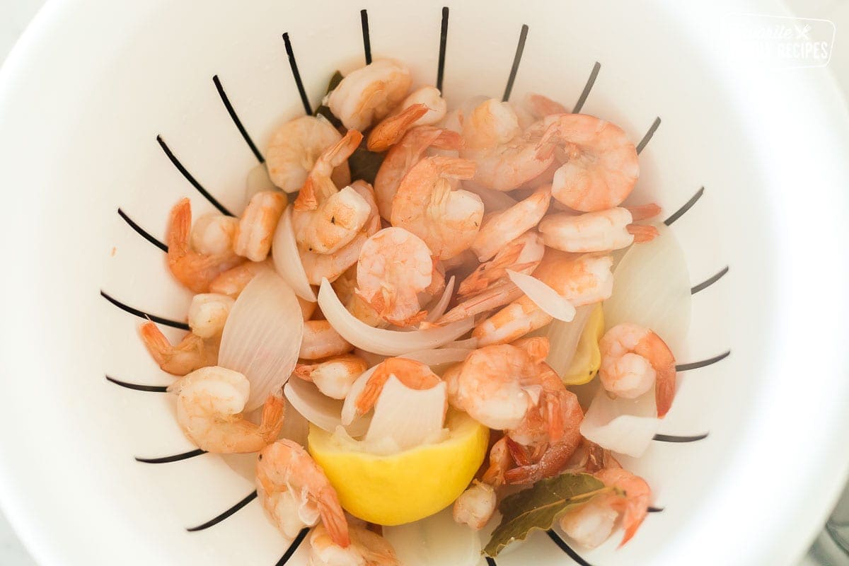 Shrimp being drained in a colander